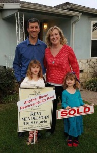 Another happy family in front of their first home!